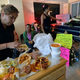 A woman prepares snacks during a funeral in Mexico City. (Photo: Pedro Pardo/Getty Images)